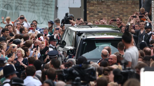Well-wishers see the royal couple off after getting a glimpse of the newest heir to the British throne.