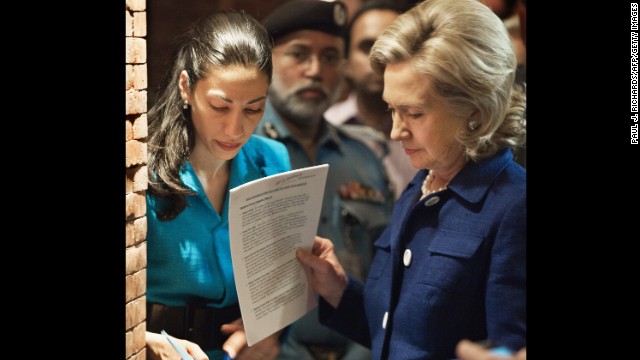 Abedin, Clinton's deputy chief of staff, helps prep Clinton with speech notes on July 19, 2010, before an interview on Pakistani TV in Islamabad.