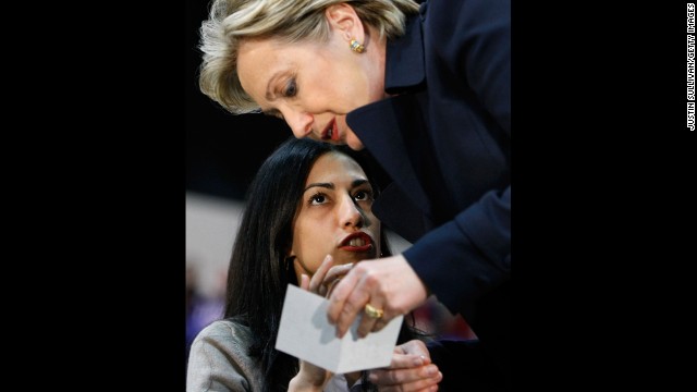 Abedin, a campaign staffer at the time, talks with then-Sen. Clinton before a rally in Los Angeles on February 2, 2008.