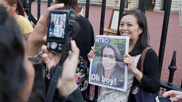 Tourists gathered outside Buckingham Palace after the birth of a son to the Duke and Duchess of Cambridge. Everyone here seems happy -- but should tourist officials be?