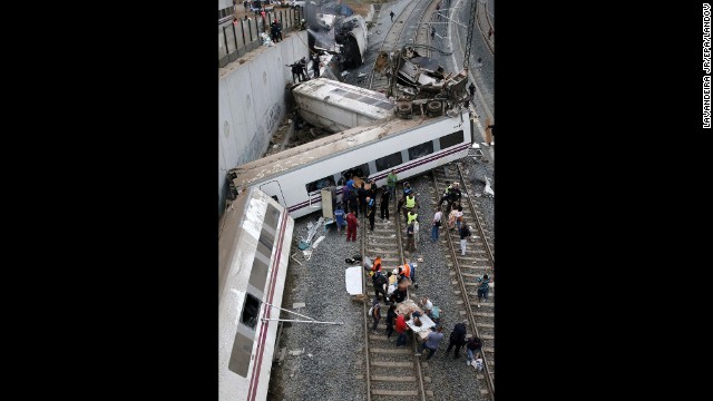 The state railway company said the train derailed on a curve as it was approaching the train station in Santiago de Compostela.