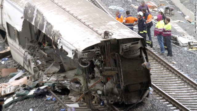 Emergency workers at the derailment scene July 25.