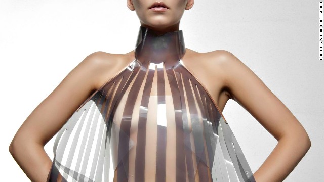 The dress that turns transparent when the wearer is aroused. Would you try it? Dutch design collective <a href='http://www.studioroosegaarde.net/info/' target='_blank'>Studio Roosegaarde</a> have developed a sensual dress called Intimacy 2.0 together with designer <a href='http://v2.nl/' target='_blank'>Anouk Wipprecht</a>. Made of leather and smart e-foils, it ‘explores the relationship between technology and intimacy’. The high-tech panels are stimulated by the heartbeat of the wearer. Initially opaque or white, they become increasingly transparent when exposed to an electric current — in this case a beating heart. ” border=”0″ height=”360″ id=”articleGalleryPhoto001″ style=”margin:0 auto;” width=”640″/><cite style=