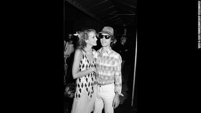 In his private life, Jagger also favors slacks that cut a sharp figure. Here, Jagger poses with his now-ex Jerry Hall around 1981. 