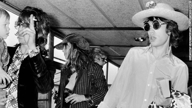 Rolling Stones guitarist Keith Richards holds his son Marlon alongside Anita Pallenberg, the mother of his first three children, and Mick Jagger, right, in 1970.