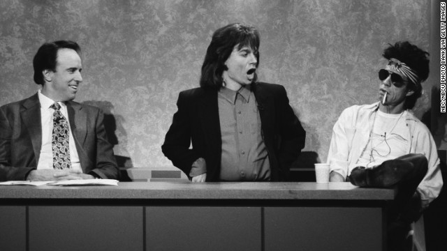 From left, Kevin Nealon, Mike Myers as Mick Jagger, and Mick Jagger as Keith Richards do a "Weekend Update" skit on "Saturday Night Live" in 1993.