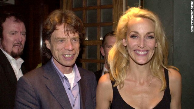 Mick Jagger and Jerry Hall leave The Ivy Restaurant in London after Hall's debut in the stage production of "The Graduate" in 2000.