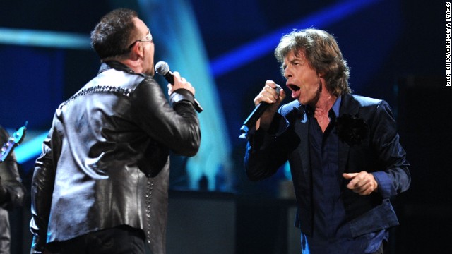 Bono of U2 and Mick Jagger perform together at a concert at Madison Square Garden in New York marking the 25th anniversary of the Rock and Roll Hall of Fame on October 30, 2009.