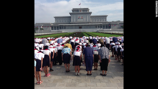 Schoolchildren pay their respects at Pyongyang's <a href='http://instagram.com/p/cLmS-gBqO3/' target='_blank'>Kumsusan Palace of the Sun</a>, where Kim Il Sung and Kim Jong Il lie in state in glass coffins.