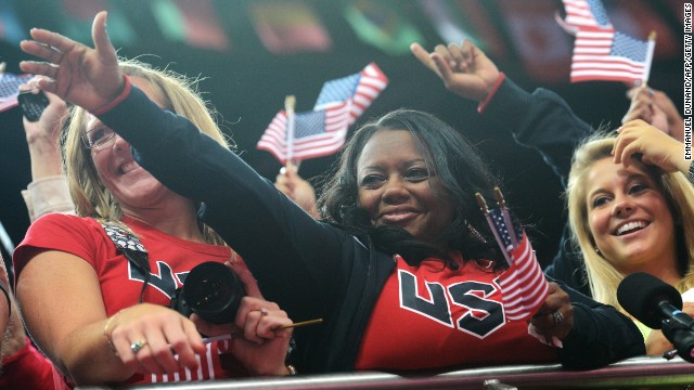 Her mother Natalie Hawkins was left crying tears of joy after watching the teen win two gold medals at the London 2012 Olympics. Hawkins is pictured with Missy Parton (left) -- the mother of Gabby's host family while training in Iowa. 