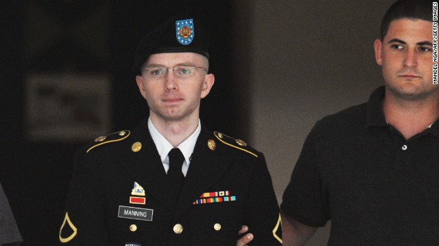 Army Pfc. Bradley Manning is escorted from court on July 25, 2013 in Fort Meade, Maryland on July 25, 2013. The trial of Manning, accused of 'aiding the enemy' by giving secret documents to WikiLeaks, is entering its final stage Thursday as both sides present closing arguments. AFP PHOTO/Mandel NGAN (Photo credit should read MANDEL NGAN/AFP/Getty Images) 