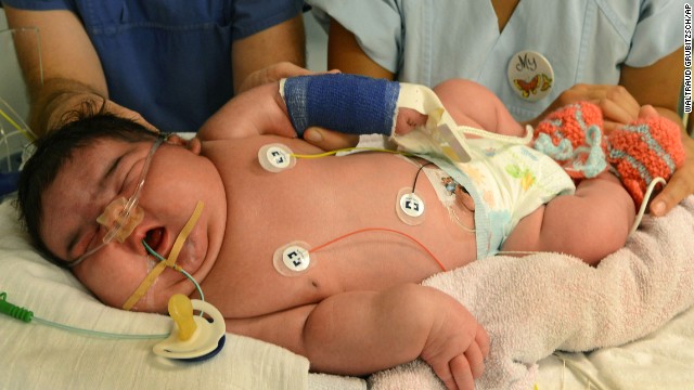 Staff take care of Germany's heaviest newborn at the University Hospital in Leipzig, Germany, on Monday