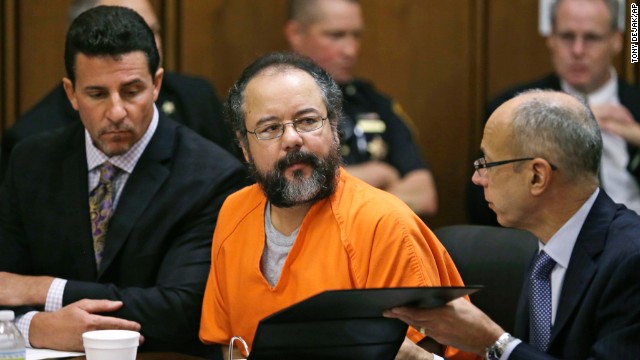 Ariel Castro listens during the sentencing phase of his trial Thursday, August 1, in Cleveland alongside defense attorneys Craig Weintraub, left, and Jaye Schlachet. Castro held three women captive for years inside his Ohio home until their escape in May. He pleaded guilty to 937 counts, including murder and kidnapping. On September 4, Castro was found dead inside his prison cell in Orient, Ohio.