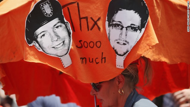 Demonstrators in Berlin hold a protest march on Saturday, July 27, in support of Snowden and WikiLeaks document provider Bradley Manning. Both men have been portrayed as traitors and whistle-blowers. Manning was acquitted on July 30 on the most serious charge of aiding the enemy, but he was convicted on several other counts and likely faces a lengthy term in a military prison.