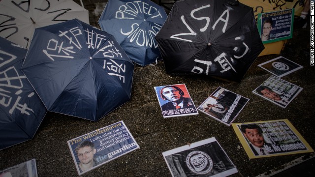 Umbrellas with slogans are lined up before a protest march to the U.S. consulate in Hong Kong on June 15. Snowden was hiding in Hong Kong, where he arrived on May 20 before blowing the lid off the NSA surveillance operation.