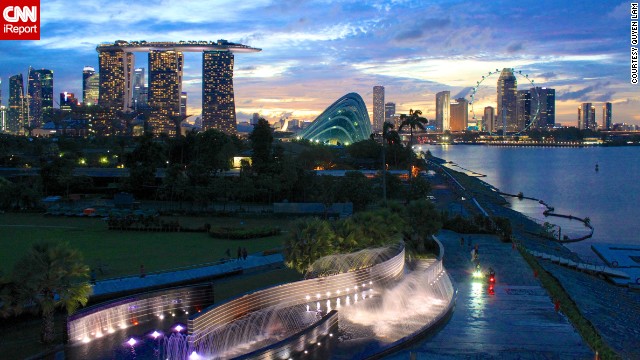 Singapore's <a href='http://ireport.cnn.com/docs/DOC-941405'>unique skyline</a> glows in the light of dusk.