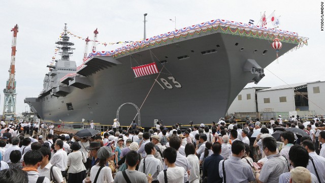 A launching ceremony for Japan's largest military ship since World War II is held in Yokohama on Tuesday, August 6. The 820-foot-long, 19,500-ton flattop destroyer Izumo will be deployed in March 2015. 