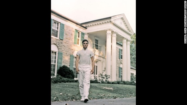 Elvis walks the grounds of Graceland in 1957. 