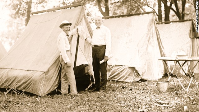 President Warren Harding, right, goes camping with Firestone Tire Co. founder Harvey Firestone in 1921.