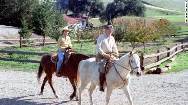 President Ronald Reagan and first lady Nancy Reagan take a horseback ride at their Rancho del Cielo vacation home in Santa Barbara, California. 