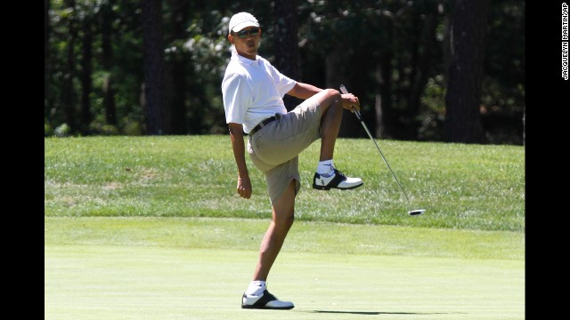 Obama <a href='http://politicalticker.blogs.cnn.com/2013/08/11/obama-tees-off-vacation/' target='_blank'>reacts as he misses a shot while golfing</a> on the first hole at Farm Neck Golf Club in Oak Bluffs, Massachusetts, on Sunday, August 11.