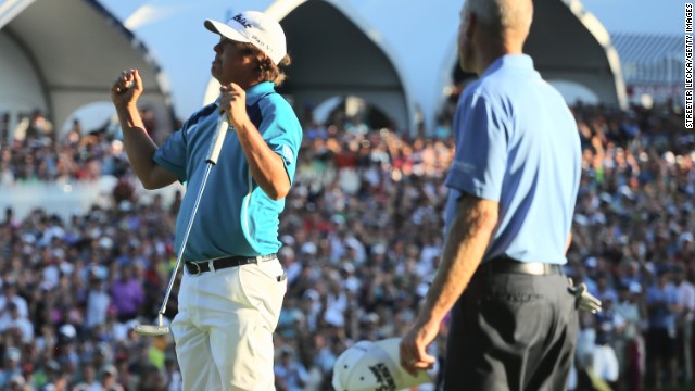 Jason Dufner celebrated in low-key fashion after winning his first major at the PGA Championship. He beat Jim Furyk, right, by two shots. 