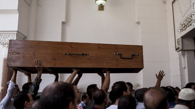 Morsy supporters carry a coffin into a mosque in Cairo's Nasr City on August 15.