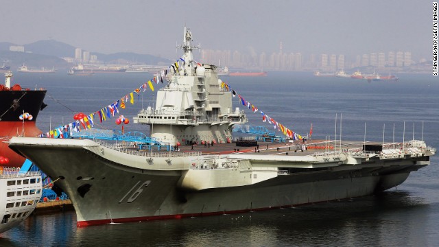 China's first aircraft carrier, former Soviet carrier Varyag, docked after its handover to the People's Liberation Army (PLA) navy in Dalian, northeast China's Liaoning province in 2012. China says the aircraft carrier is a training vessel, but analysts say the ship is a valuable asset in its ambition to gain a blue-water navy.