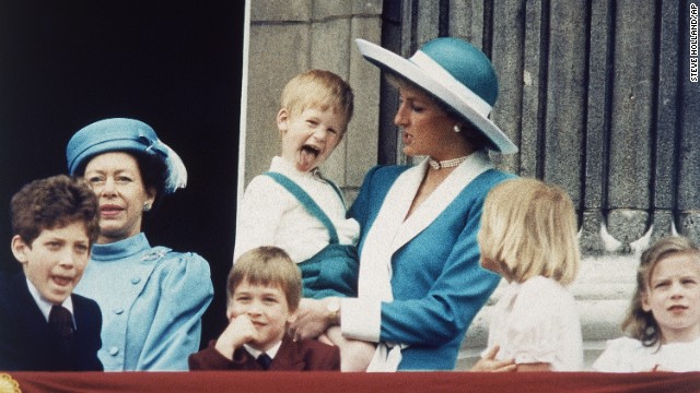 Prince Harry shows a bit of his personality, which doesn't appear to please his mother, on June 11, 1988, on the balcony of Buckingham Palace.
