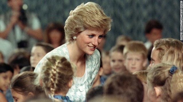 Diana listens to children during a visit to the British international school in Jakarta, Indonesia, on November 6, 1989.