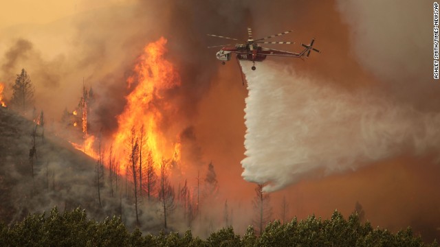 A helicopter battles the flames near Hailey on Friday, August 16. The Beaver Creek Fire was ignited by lightning on August 7.