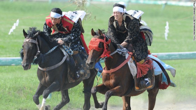 The elaborately attired warriors continue at Soma-Nomaoi festival in Japan, where samurai horsemen go head-to-head in three days of competitions. 