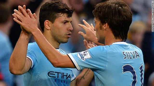 Sergio Aguero and David Silva celebrate scoring for Manchester City to help set up victory against Newcastle.