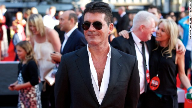 Simon Cowell: 'I'm proud to be a dad'