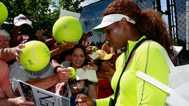 U.S. Open champion Serena Williams signs her autograph for fans at the USTA Billie Jean King National Tennis Center.