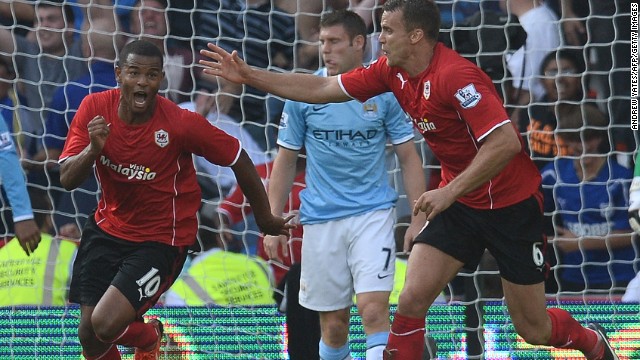 Cardiff striker Fraizer Campbell (left) celebrates with teammate Ben Turner (right) after scoring during the 3-2 victory over Manchester City.