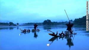 The Nanxi River -- where travelers can watch local fishermen team with cormorants to catch fish.