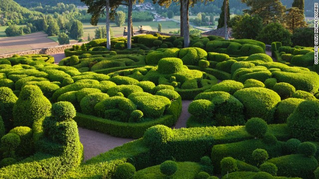 Nearly four miles of paths curl around 54 acres of hand-shaped gardens and lands.