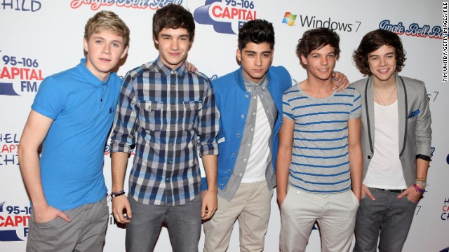 Which One Direction member recently purchased a house for his family?