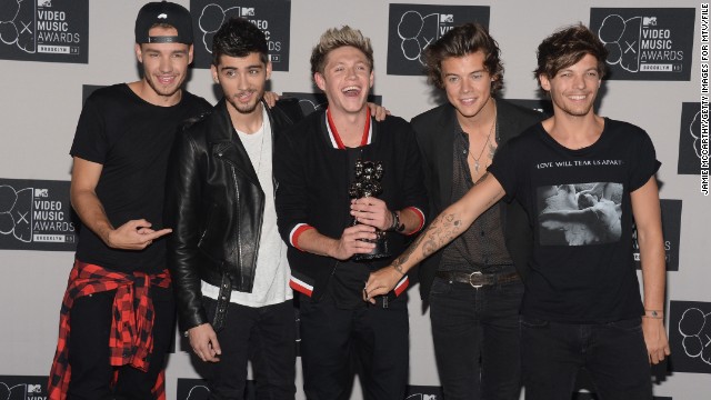 Which One Direction member recently got engaged?