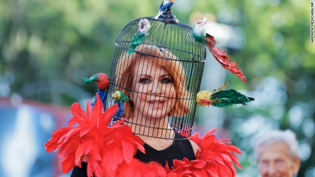 Marina Ripa di Meana wears a birdcage head ress for the screening of the film "Gravity."