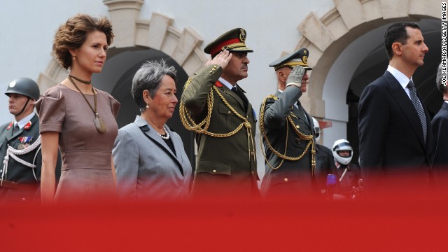 Asma al-Assad, left, appears with her husband and Austrian President Heinz Fischer and his wife, Margit, during a welcoming ceremonies on April 27, 2009, durring a two-day state visit to Vienna.