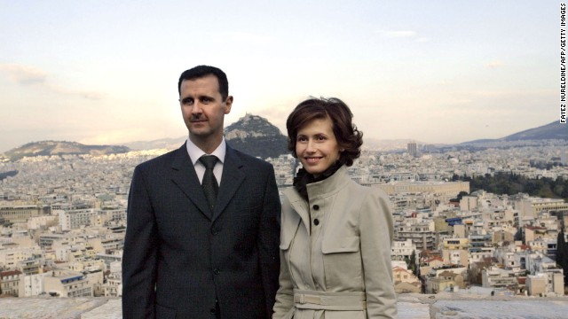 Al-Assad and his wife, Asma, pose during their visit to the Acropolis in downtown Athens on December 15, 2003.