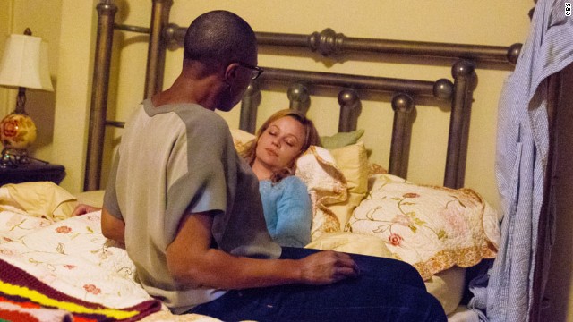 'Under the Dome': Aisha Hinds and Samantha Mathis as Carolyn Hill and Alice Calvert, a married couple with a daughter.