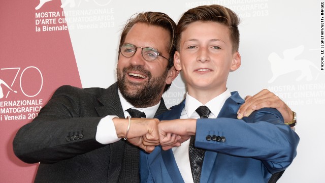 Director Rick Ostermann and actor Levin Liam attend the "Wolfschildren" photo call on August 29.