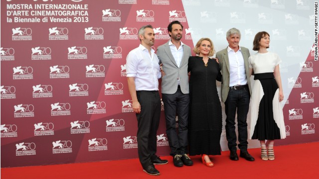 From left, producers Ian Canning and Emile Sherman, Australian writer Robyn Davidson, U.S. director John Curran and Australian actress Mia Wasikowska, pose during the photocall of "Tracks" on August 29.