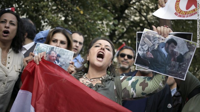 A supporter of the Syrian regime demonstrates August 29 in Paris against possible Western military involvement in Syria.