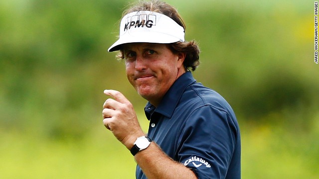 Phil Mickelson reacts after holing an eagle putt on the second green at the TPC Boston on the way to an eight-under 63. 