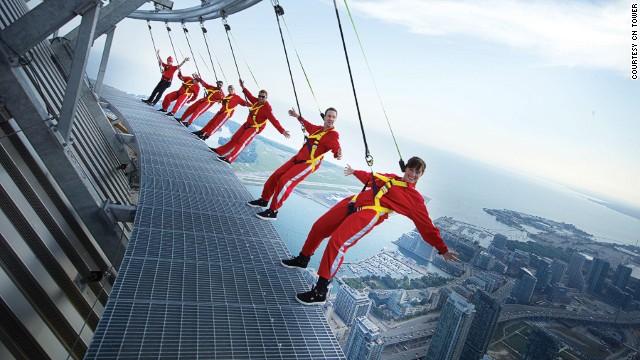 Located on the roof of the CN Tower's restaurant at a height of 1,168 feet (356 meters), the EdgeWalk in Toronto allows visitors to slip into climbing harnesses and walk around the edge of Canada's tallest structure.
There's also a glass floor 1,122 feet (342 meters) above ground level, and although this glass is only 2.5 inches thick, it's strong enough to hold 14 hippos -- if they could fit in the elevator.