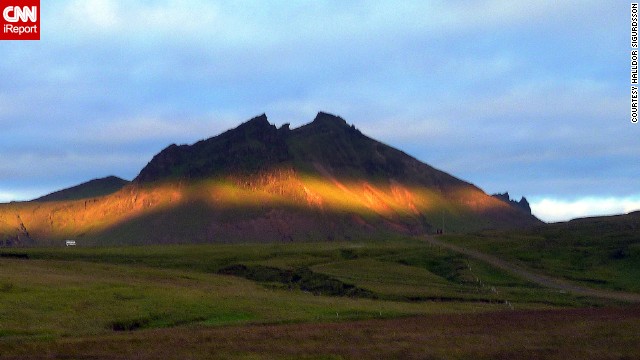 During the summer, Iceland puts on a splendid show. Reykjavik resident Halldor Sigurdsson captured this photo of a <a href='http://ireport.cnn.com/docs/DOC-842230'>spectacular strip of sunlight</a> draped against a peak near the village of Vik, located in the southernmost tip of Iceland. He said he took this and other pictures during a summer vacation in 2011. "Maybe the photos explain why the astronauts that went to the moon came first to Iceland in 1967 to practice their lunar trip," he said.
